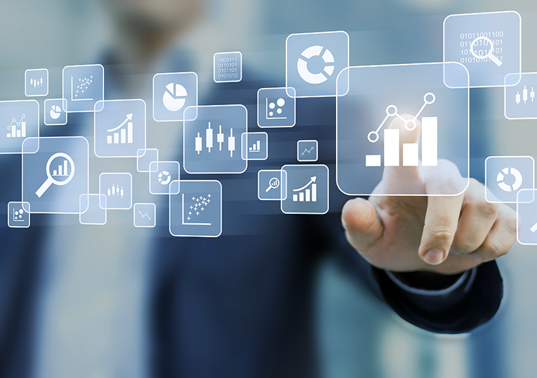 Photograph of a person interacting with a transparent digital interface displaying various white data visualization icons, including bar charts, pie charts, line graphs, and scatter plots. The interface highlights data analysis and business intelligence concepts, with the person's finger pointing at a bar chart icon, suggesting active data exploration and decision-making.